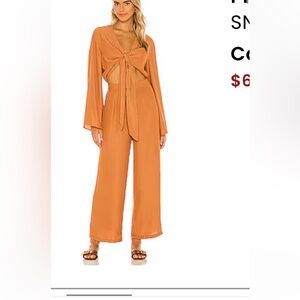 Pluto Jumpsuit in Rust
SNDYS size 4! Worn once, from revolve